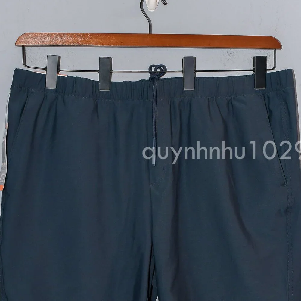 NWT Greg Norman Men’s Pull-On Short in TAN